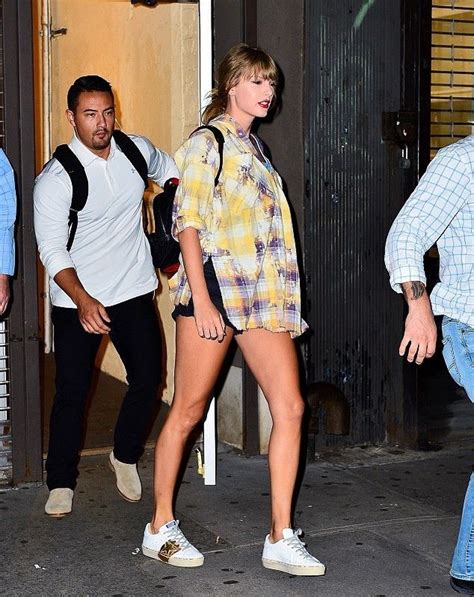 taylor swift wearing golden goose.